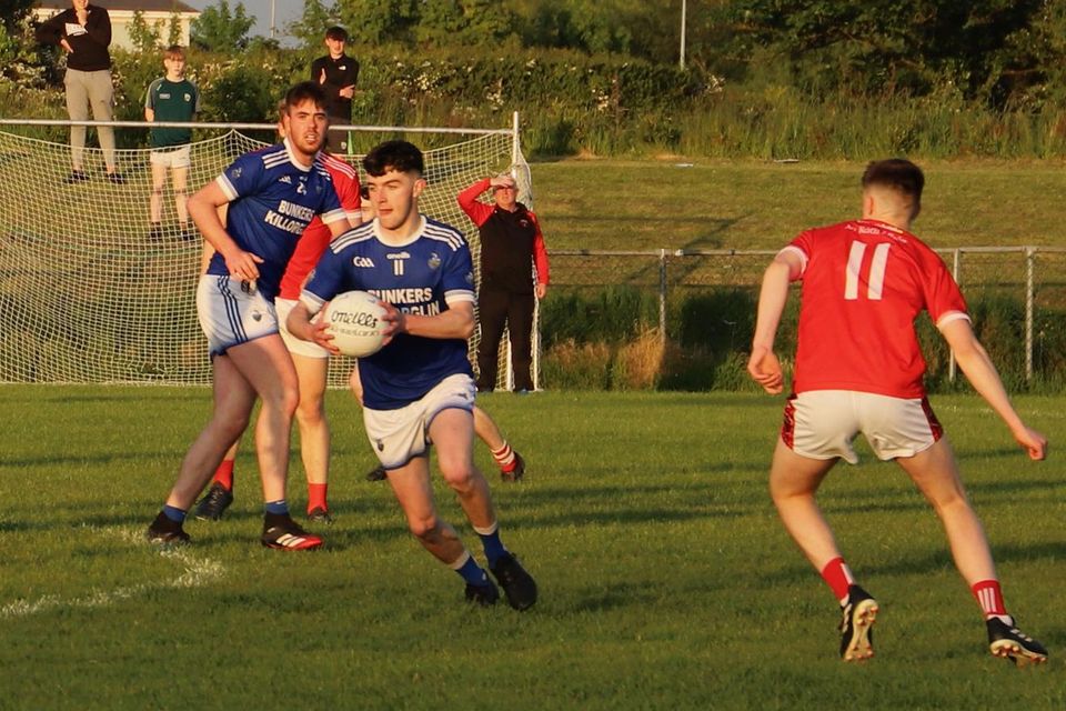 Laune Rangers' Eoghan Hassett in action against Rathmore in their U-21 quarter-final in Killorglin on Wednesday evening. Photos by Michael G Kenny