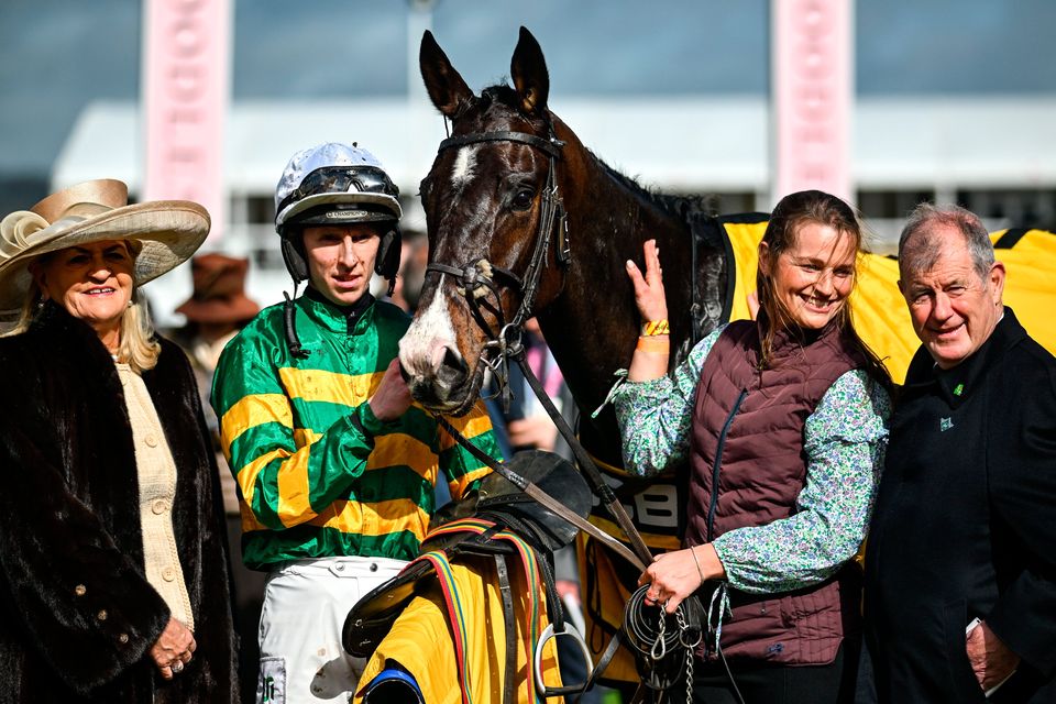 Mark Walsh celebrates with owner JP Manus and winning connections after winning the JCB Triumph Hurdle aboard Majborough on day four