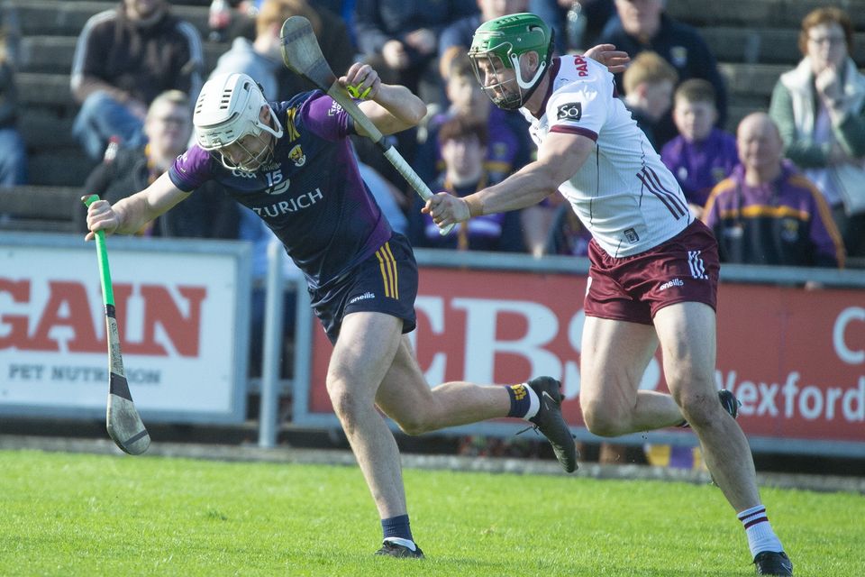 Wexford's Rory O'Connor tries to shake off the attentions of Galway's Adrian Tuohy. Photo: Jim Campbell