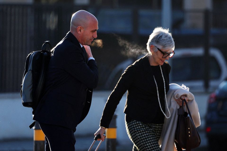 Luis Rubiales and his lawyer Olga Tubau arrive at the court. Photo: Reuters