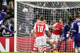 thumbnail: Anderlecht's Andy Najar heads to score against Arsenal during their Champions League Group D soccer match at Constant Vanden Stock stadium in Brussels