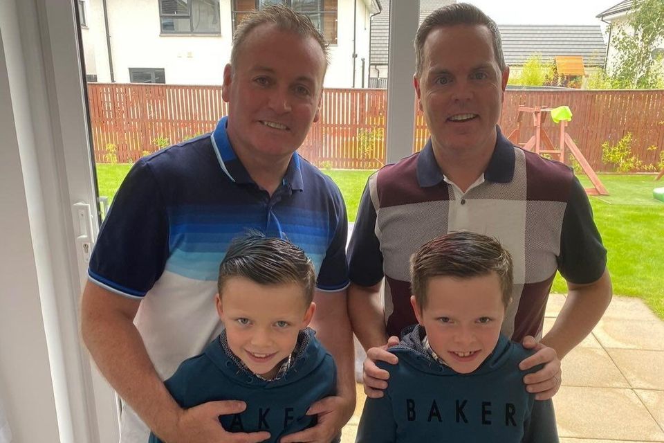 Padraig (left) and his partner Thomas with their sons, Will and Ally.