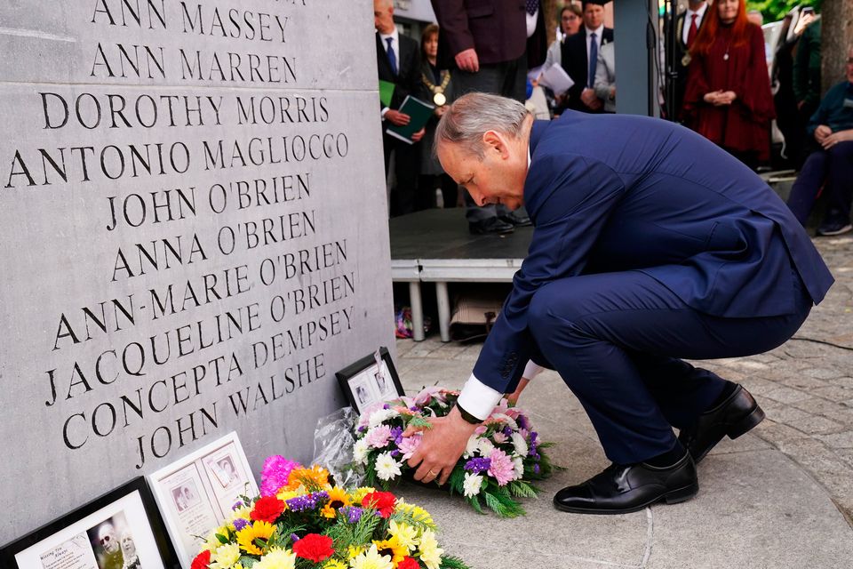 Tánaiste Micheál Martin lays a wreath on Talbot Street to mark the 49th anniversary of the bombings last year. Pic: Brian Lawless/PA