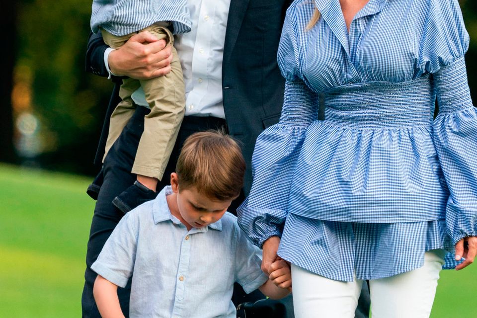 Jared Kushner (C-L) and Ivanka Trump (R) walk with their children Theodore (L) and Joseph (C-R) across the South Lawn as they return from a weekend stay in Bedminster, New Jersey at the White House
