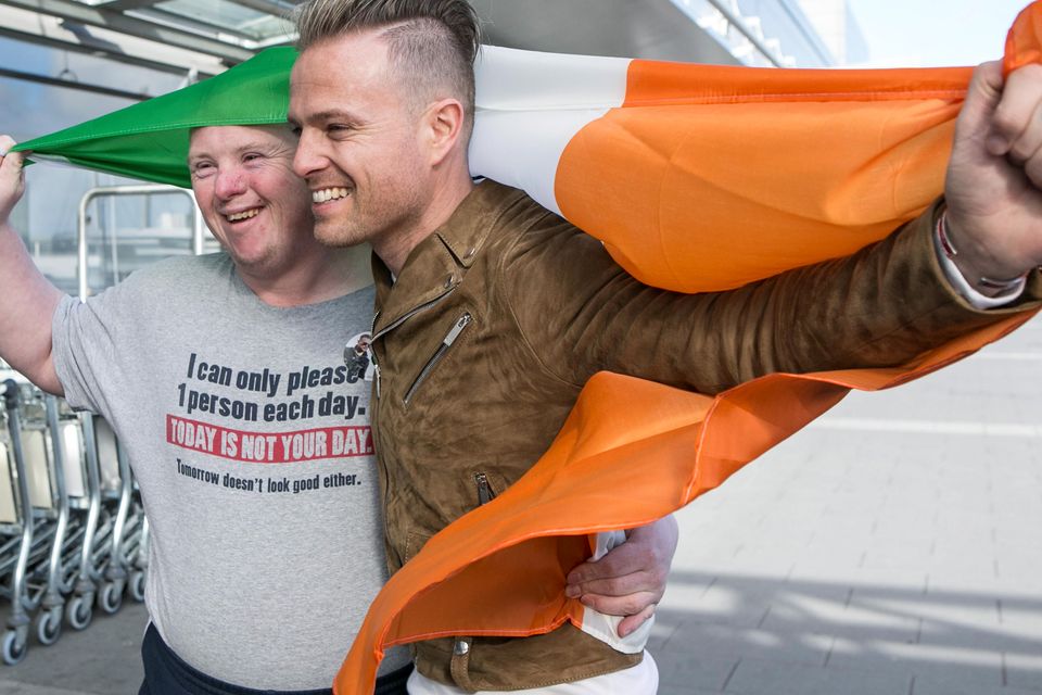 Nicky Byrne pictured with Fan Michael Dalton from New Ross  in Dublin Airport Prior to his departure to Represent Ireland in The Eurovision Song Conters in Sweden. Photo: Kyran O'Brien