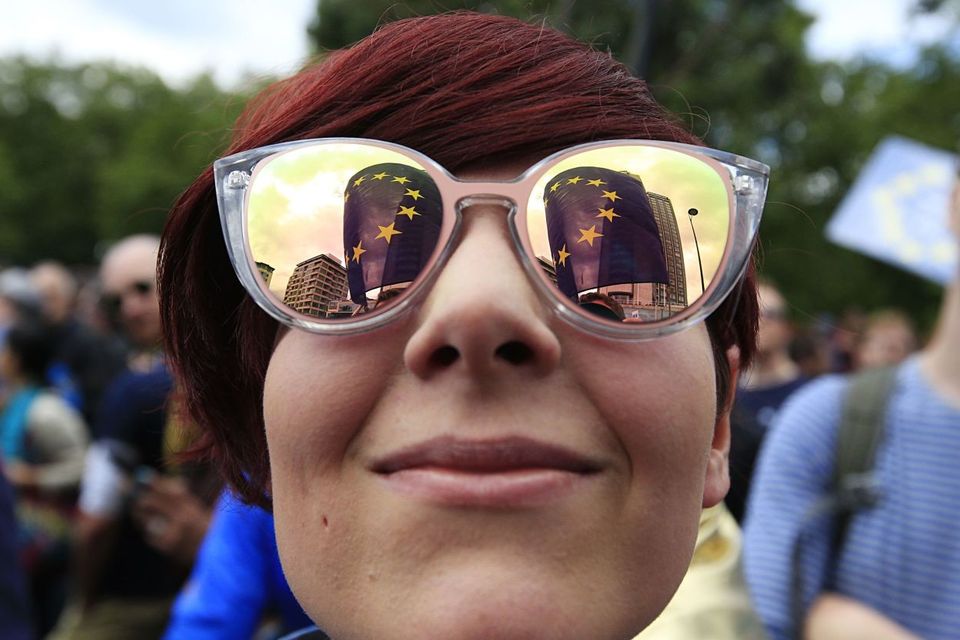 A Remain supporter has the European Union flag reflected in her sunglasses