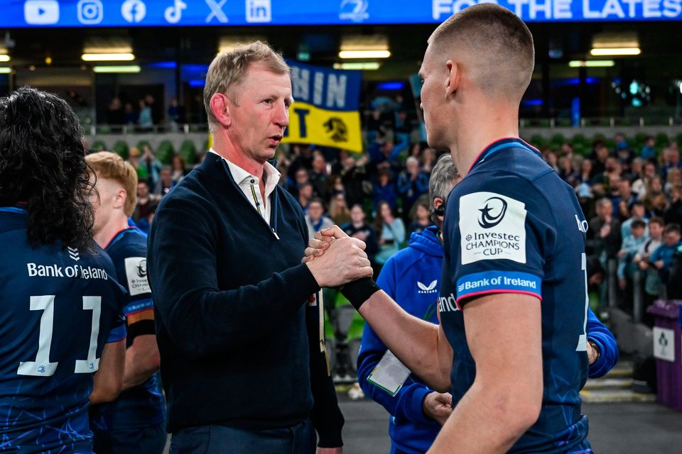 Leinster head coach Leo Cullen celebrates with Sam Prendergast after their victory over Glasgow in the Champions Cup quarter-final at the Aviva Stadium. Photo: Brendan Moran/Sportsfile