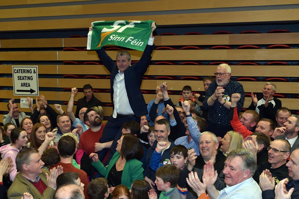 9-2-2020: Sinn Fein's Pa Daly celebrates with outgoing TD Martin Ferris after being elected at the Kerry count centre in Killarney on Sunday.
Photo: Don MacMonagle
