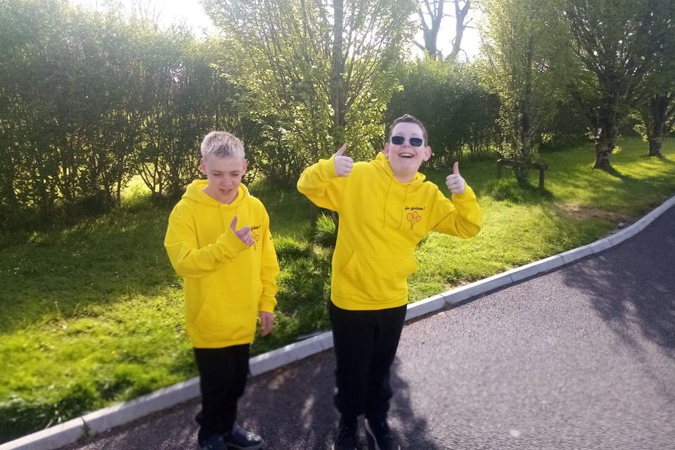 Longford twins Edward and Patrick McGlynn (12) have made a remarkable recovery to full health in a journey their older sister, Maria, together with three of her closest friends are marking in aid of the part played by healthcare workers in aiding their rehabilitation.