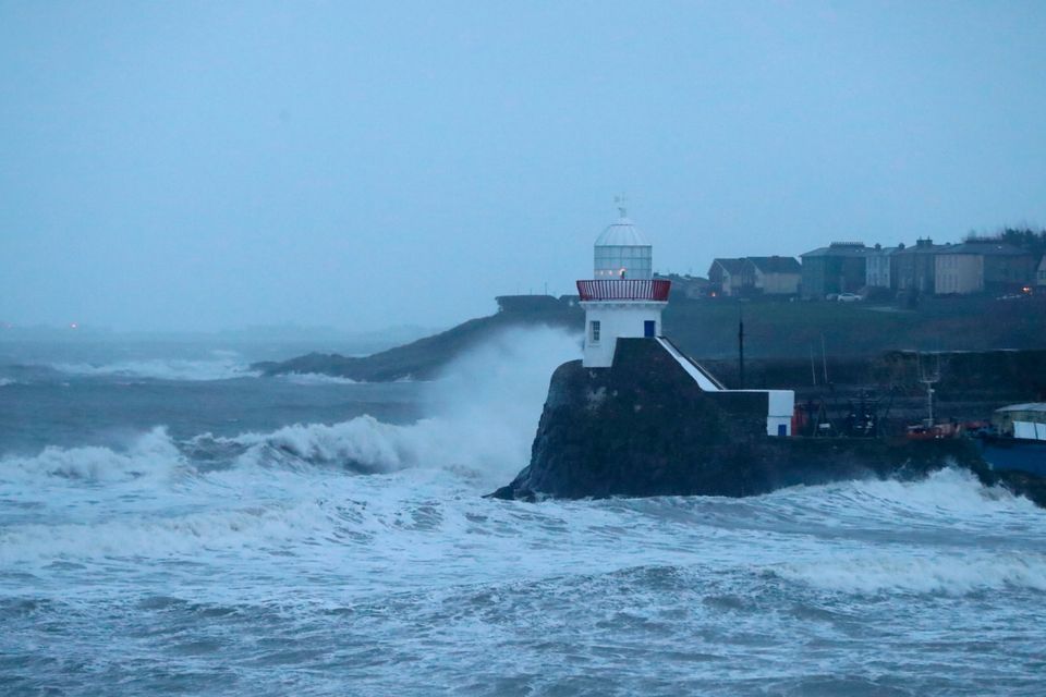 Waves pound Balbriggan lighthouse during Storm Deirdre. Photo: PA
