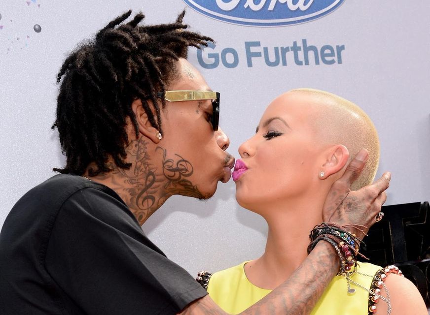 Model Amber Rose and rapper Wiz Khalifa announced they will be filing for divorce after being married for just one year