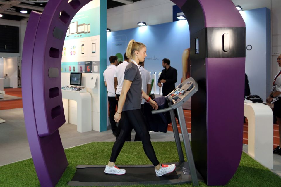 A Fitbit employee on a treadmill at last year’s IFA in the German capital