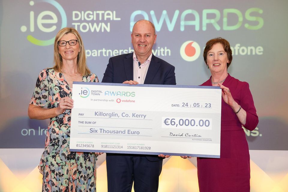 Pictured is Liam Cronin representing RDI Hub Digital Business, Kerry, Killorglin, Winner in Digital Business category at the .IE Digital Town Awards 2023 alongside Sinead Bryan, Managing Director Vodafone Business, category sponsor and Oonagh McCutcheon, National Director, .IE Digital Town Programme.