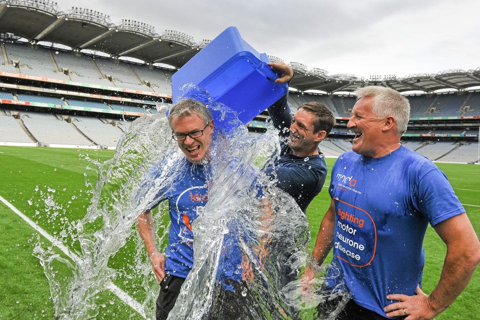 Armagh football manager Kieran McGeeney pours water over Sunday Game analysts Joe Brolly, left, and Pat Spillane, right, as part of the 'Ice Bucket Challenge' in 2014. But there's no banter these days. Photo: Dáire Brennan/Sportsfile