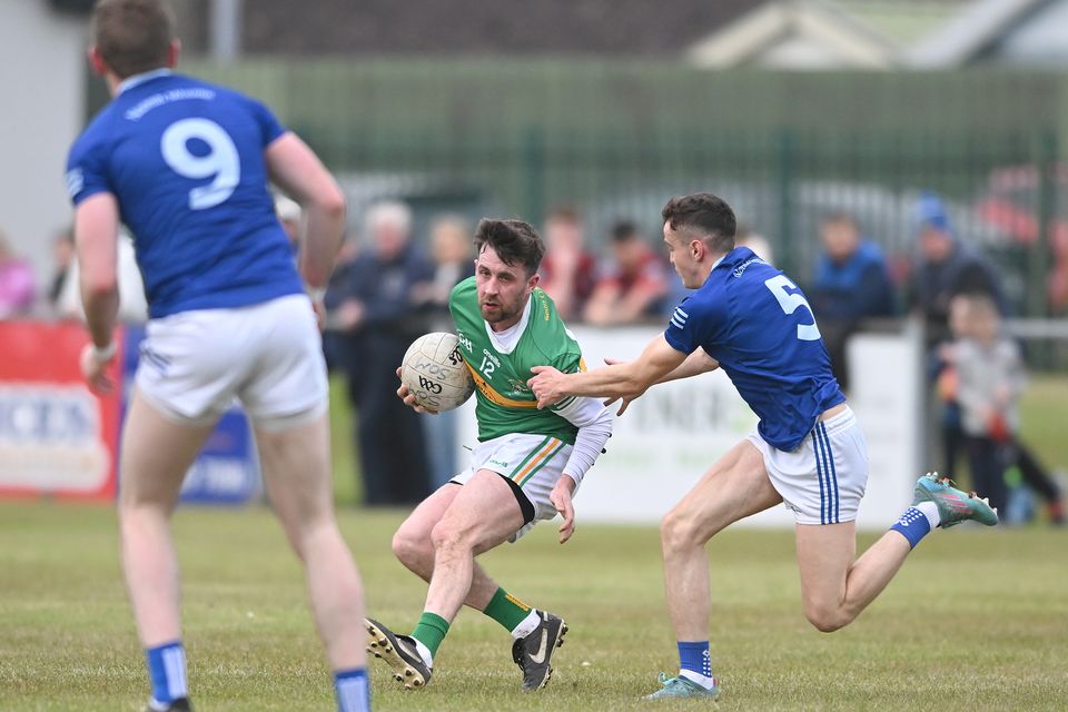 Sean O'Mahonys' Johnny Connolly is challenged by Tadhg McDonnell of Ardee St Mary's during the clubs' Division 1 meeting in Dundalk on Friday night. Picture: Ken Finegan/Newspics