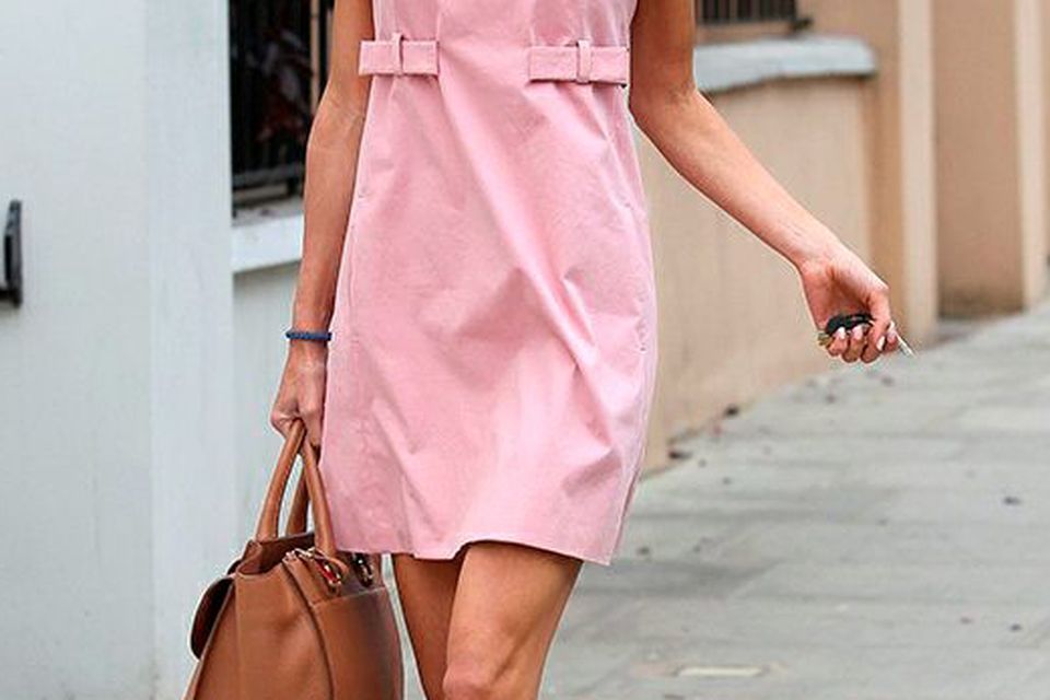 2. Newly engaged to the world,'s most eligible bachelor, Amal in a pink shift dress.