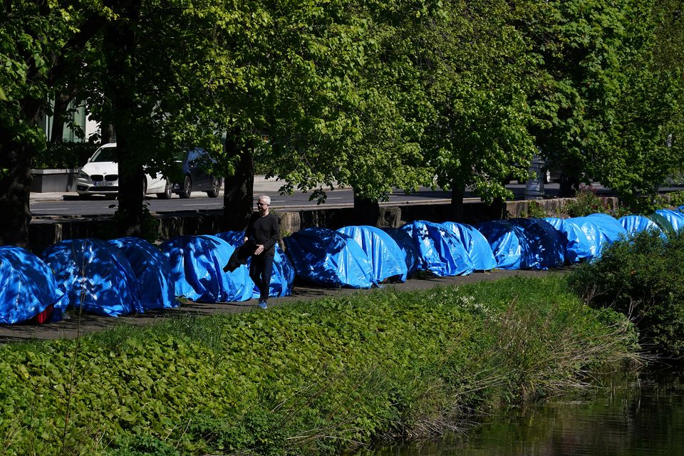 Tents have been pitched along a stretch of the Grand Canal (Brian Lawless/PA)