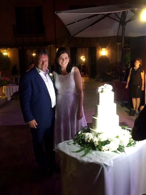 Sweet smiles as Sharon and Emmet prepare to cut the cake at their wedding reception in Spain last week.