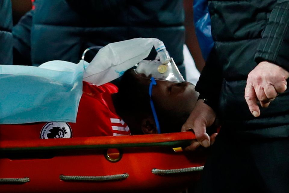 Manchester United's Romelu Lukaku is stretchered off after sustaining a head injury