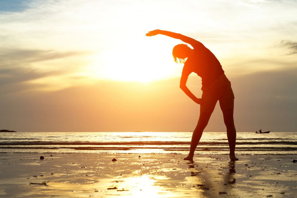 Stretch in the evenings: Exercise later in the day to avoid really hot temperatures