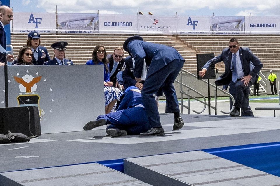 President Joe Biden falls on stage during the 2023 United States Air Force Academy Graduation Ceremony at Falcon Stadium at the United States Air Force Academy in Colorado Springs, Colorado (Andrew Harnik/AP)