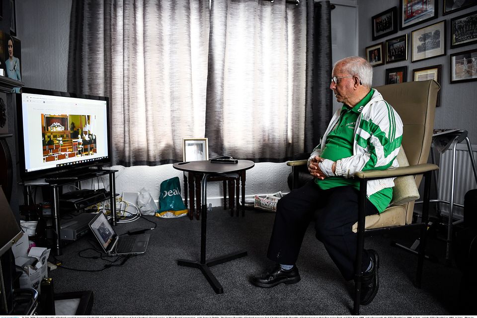 21 July 2020; Former Republic of Ireland squad kit manager Charlie O'Leary watches the broadcast of Jack Charlton’s funeral service, in West Road Crematorium, at his home in Dublin. The former Republic of Ireland manager Jack Charlton lead the Republic of Ireland team to their first major finals at UEFA Euro 1988, and subsequently the FIFA World Cup 1990, in Italy, and the FIFA World Cup 1994, in USA.  Photo by Ray McManus/Sportsfile