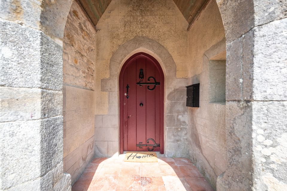 The arched front door