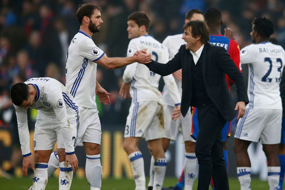Chelsea manager Antonio Conte and Branislav Ivanovic celebrate after the game
