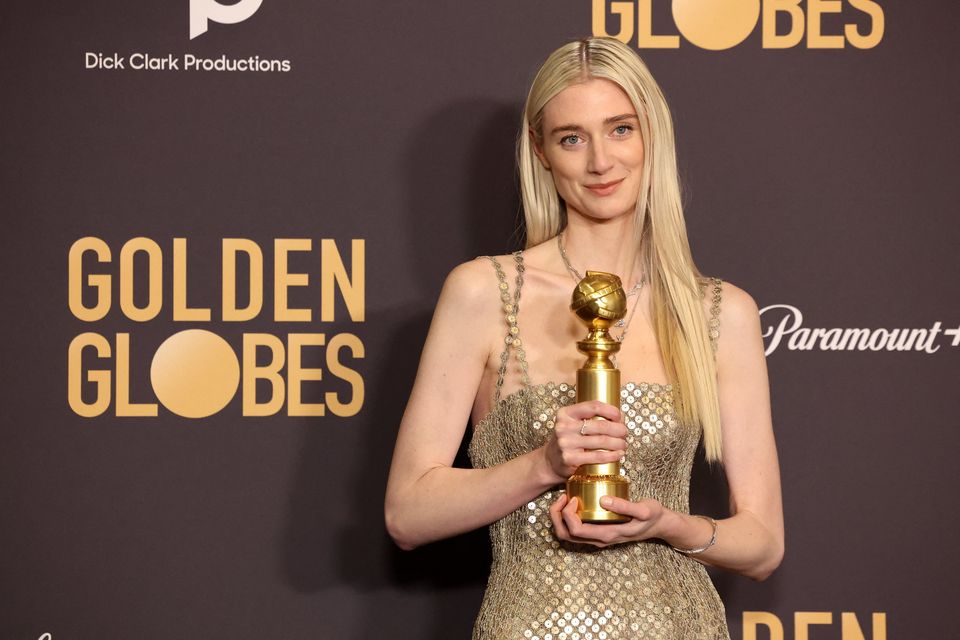 Elizabeth Debicki poses with the award for Best Performance by a Female Actor in a Supporting Role on Television for "The Crown" at the 81st Annual Golden Globe Awards in Beverly Hills, California, U.S., January 7, 2024. REUTERS/Mario Anzuoni