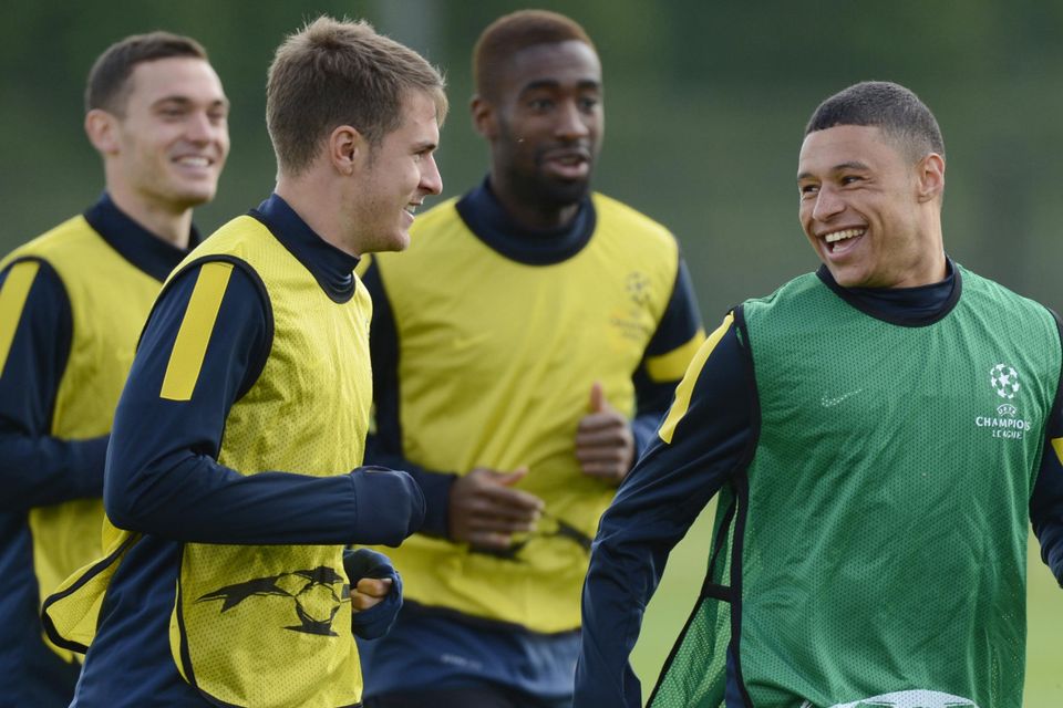 Aaron Ramsey, front left, is sorry to see Alex Oxlade-Chamberlain, right, leave Arsenal