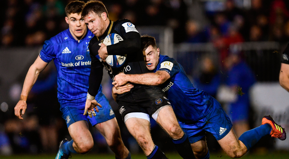 Bath's Will Chudley is tackled by Leinster's Luke McGrath. Photo: Sportsfile