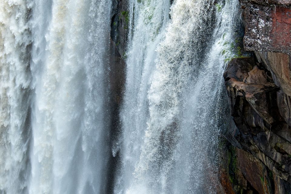 Sarah standing at the top of Kaieteur Falls. PA Photo/Sarah Marshall