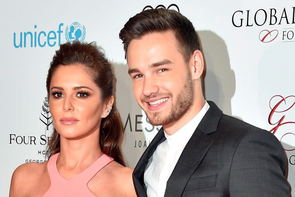 (L-R) Cheryl Fernandez-Versini and Liam Payne attend the Global Gift Gala Photocall at the Hotel Georges V on May 09, 2016 in Paris, France
