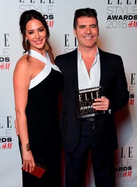 Simon Cowell with his Outstanding Contribution to Entertainment award and Lauren Silverman during the Elle Style Awards 2015