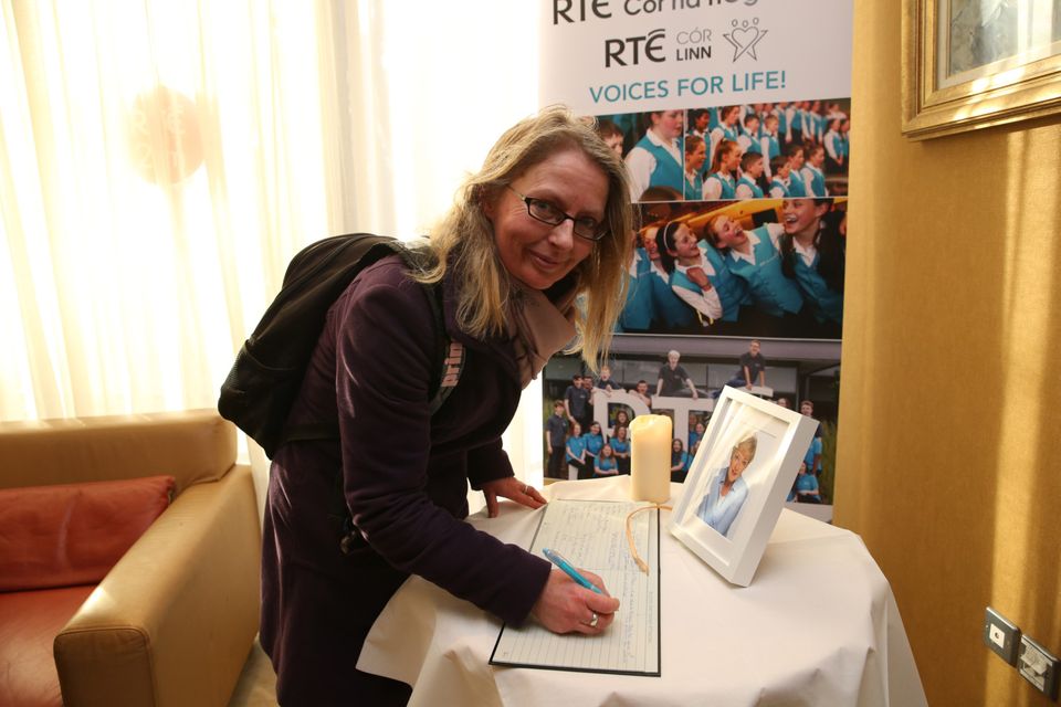 Niamh McAllister signing the book