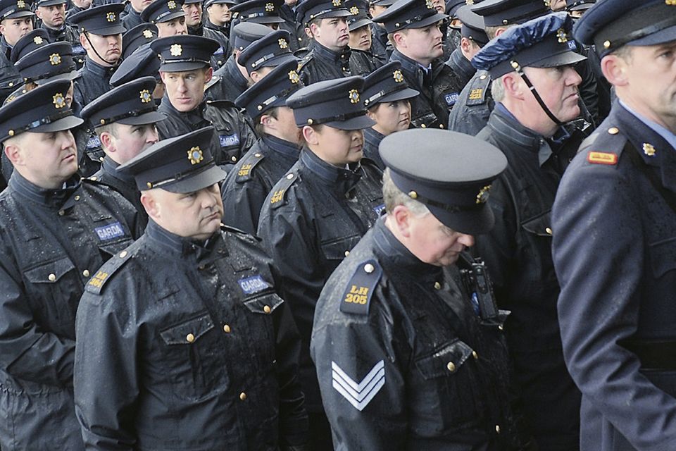 Some of the many gardaí who attended the funeral of Det Garda Adrian Donohoe last January