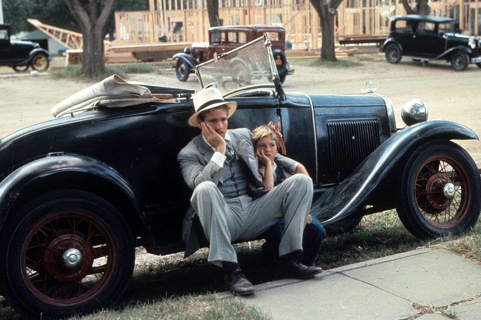 Ryan O'Neal sits with Tatum O'Neal in a scene from the film 'Paper Moon'. Photo: Columbia Pictures/Getty Images