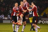 thumbnail: Marc McNulty celebrates with his teammates after scoring the winning goal for Sheffield United in their Capital One Cup quarter-final clash with Southampton at Bramall Lane. Photo: Shaun Botterill/Getty Images
