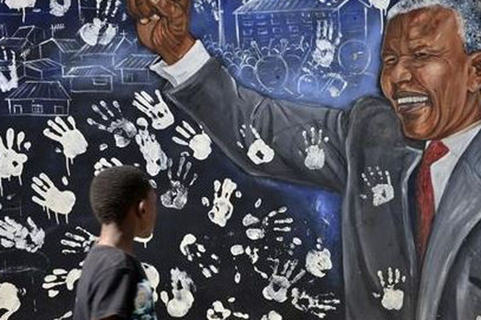 Mural outside the house of former South African President Nelson Mandela in Johannesburg. REUTERS/Mujahid Safodien