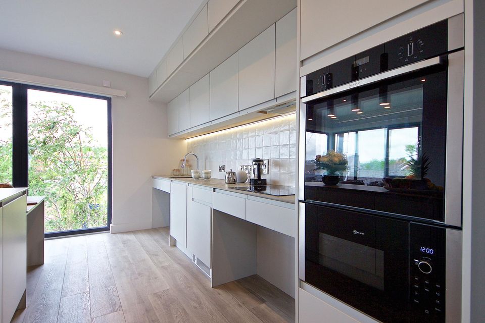 The kitchen which features top of the range Neff appliances.