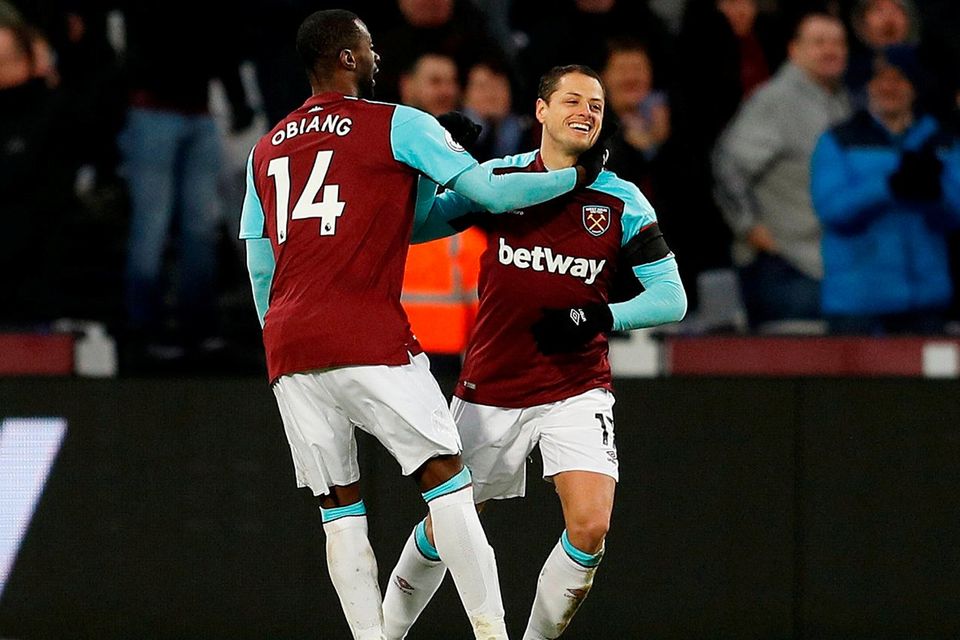 West Ham United's Javier Hernandez celebrates scoring their equaliser with Pedro Obiang
