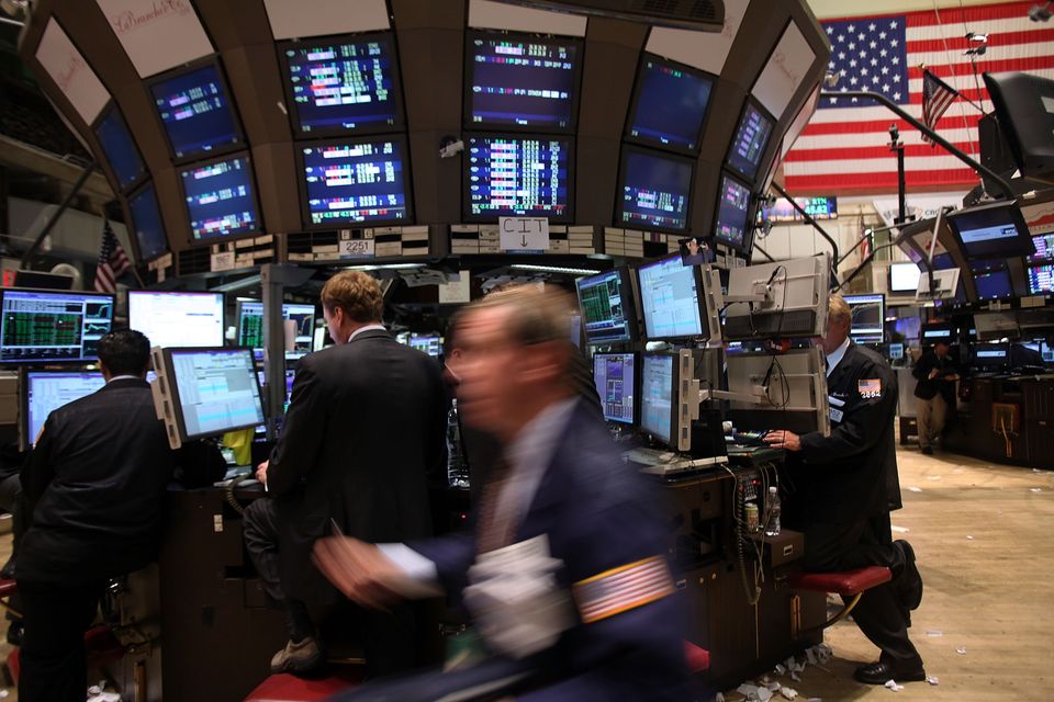 Traders work on the floor of the New York Stock Exchange. Photo: Getty