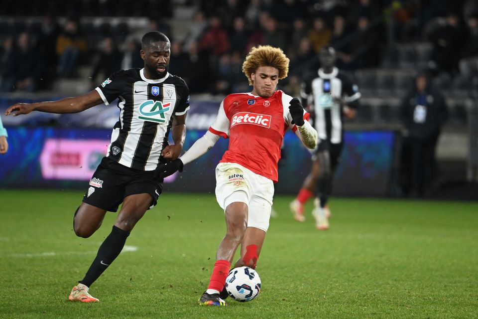 John Joe Patrick Finn (right) of Ligue 1 side Reim is in the frame for a senior Ireland call-up this summer. Photo: Getty