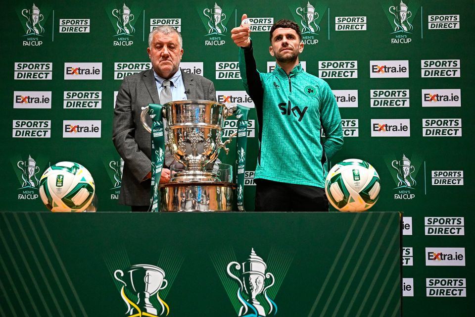 Ireland international Robbie Brady, right, draws Shelbourne FC, alongside FAI president Paul Cooke, during the FAI Cup second round draw at the Conference Centre on the Sport Ireland National Sport Campus in Abbotstown, Dublin. Photo: Seb Daly/Sportsfile