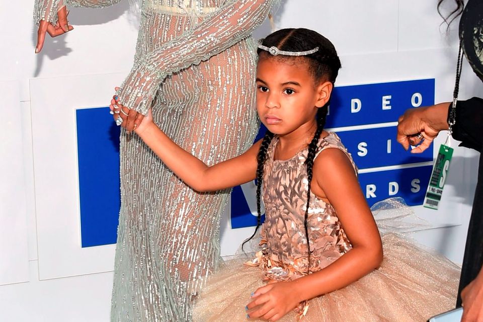 Beyonce, left, and her daughter Blue Ivy arrive at the MTV Video Music Awards at Madison Square Garden on Sunday. (Photo by Evan Agostini/Invision/AP)