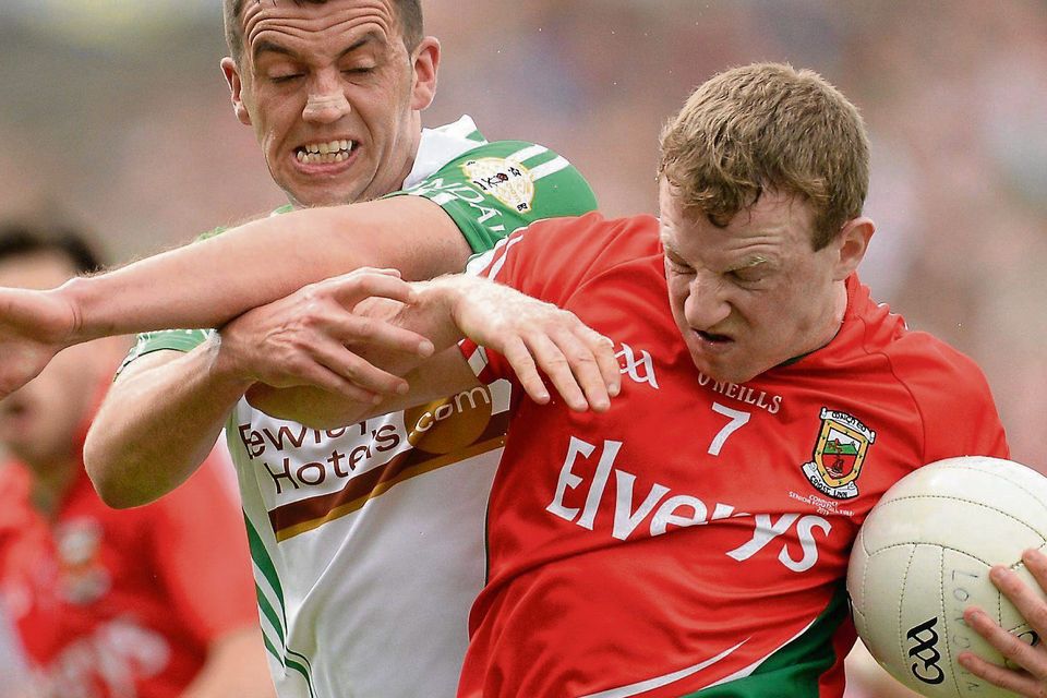 London's Gregory Crowley tackles Mayo's Colm Boyle at MacHale Park