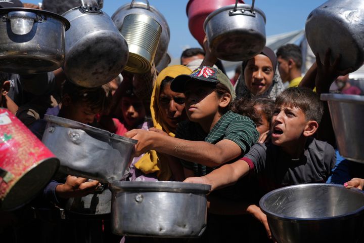 Israeli fire kills three people and injures dozens near aid site in Gaza, say medics