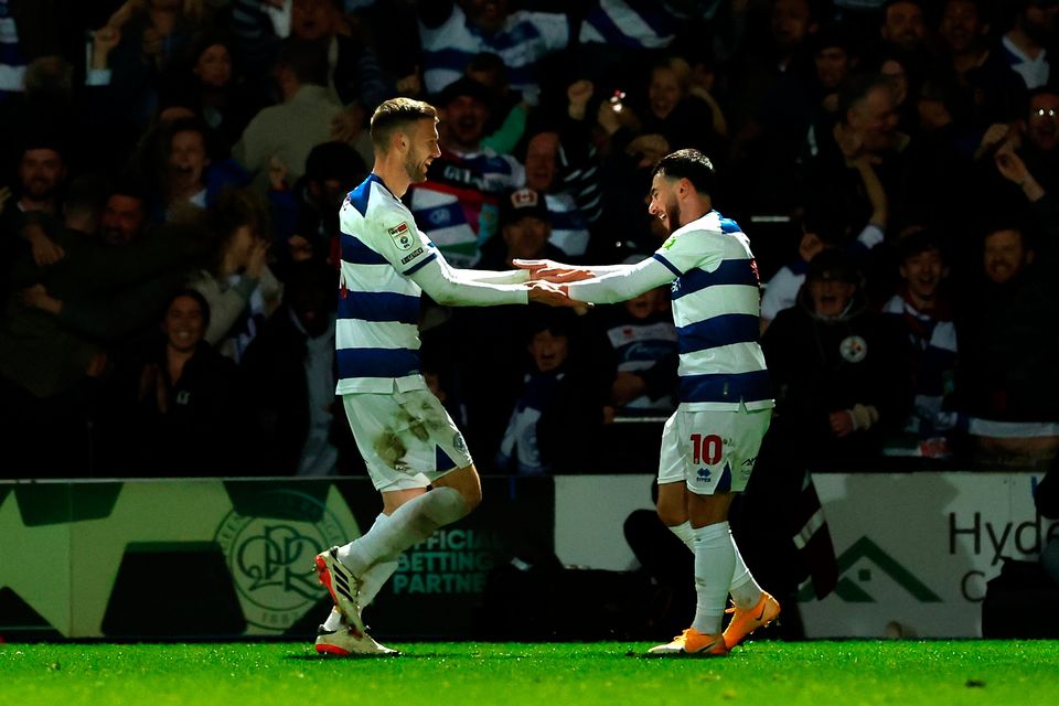 Queens Park Rangers' Sam Field (left) celebrates scoring their side's fourth goal of the game with team-mate Ilias Chair during the Sky Bet Championship win over Leeds