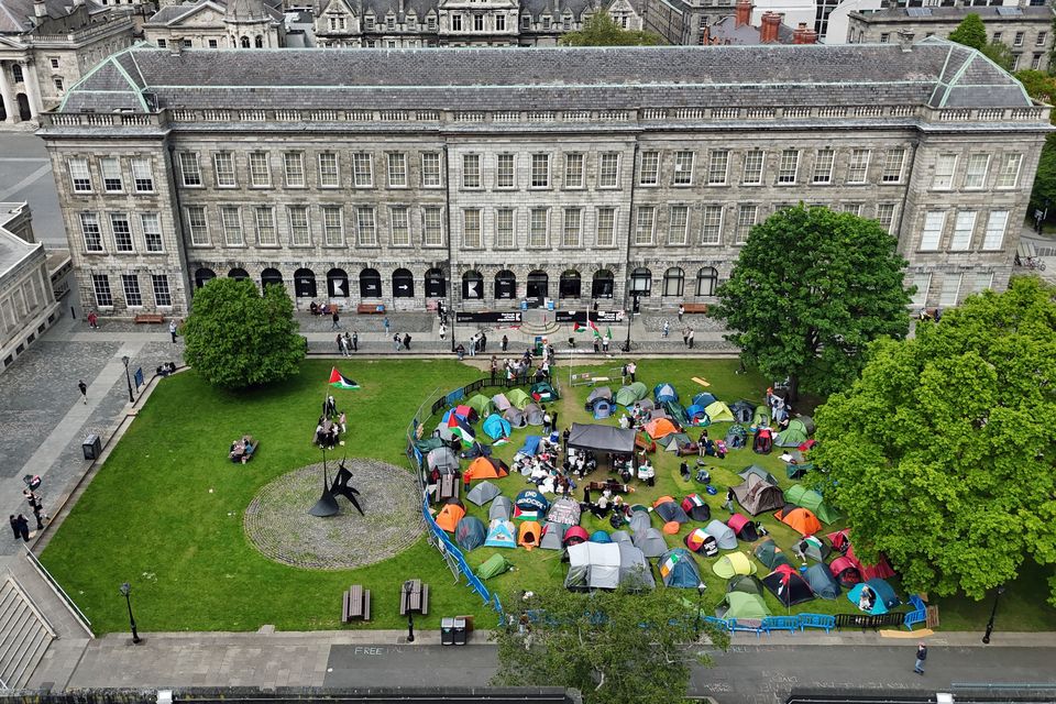 Students taking part in an encampment protest over the Gaza conflict on the grounds of Trinity College in Dublin (Niall Carson/PA)