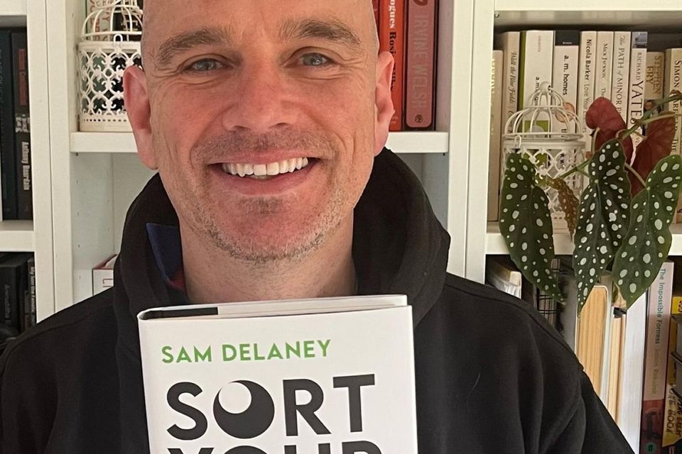 Author Sam Delaney with his book Sort Your Head Out. Photo: Twitter @DelaneyMan